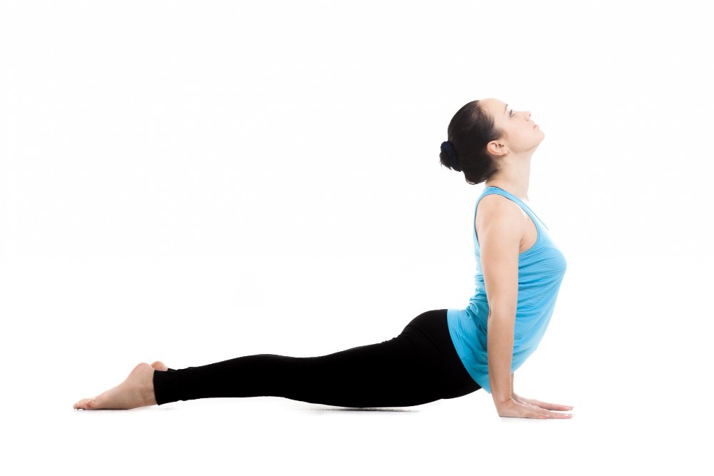 Winter Slimdown 15 Belly-Blasting Yoga Poses Bhujangasana (Cobra Pose)